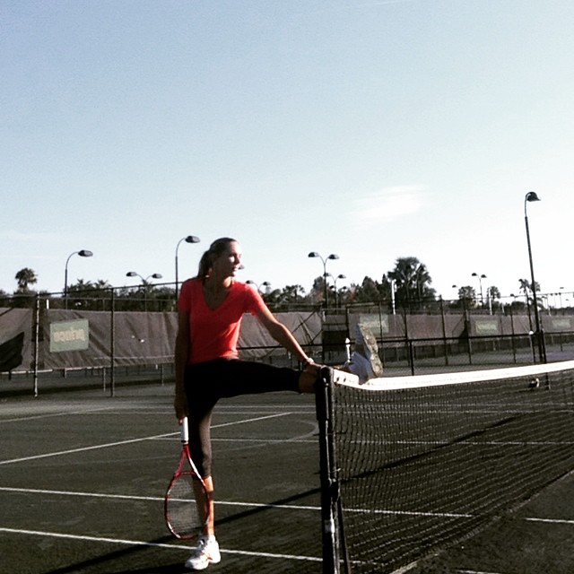 Nicole Vaidisova in court stretching her legs